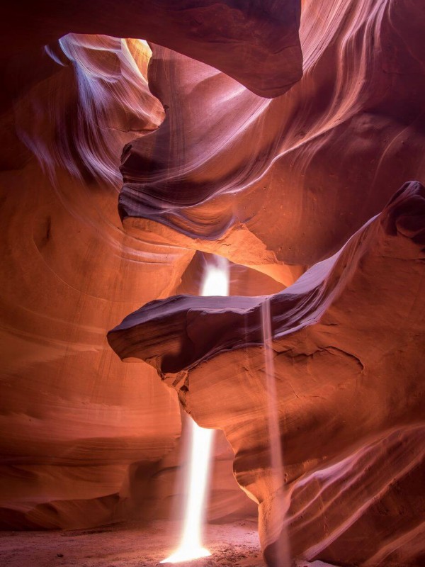 Antelope canyon lit by sunbeams
